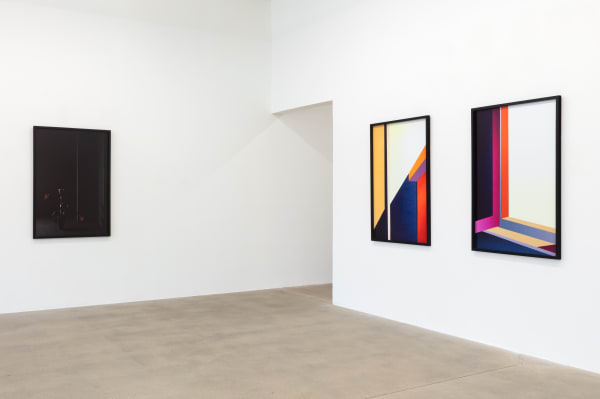 installation view of photographs by Popel Coumou