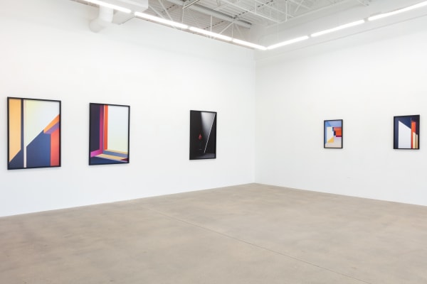 installation view of photographs by Popel Coumou