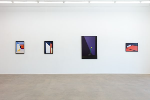 installation view of photographs by Popel Coumou