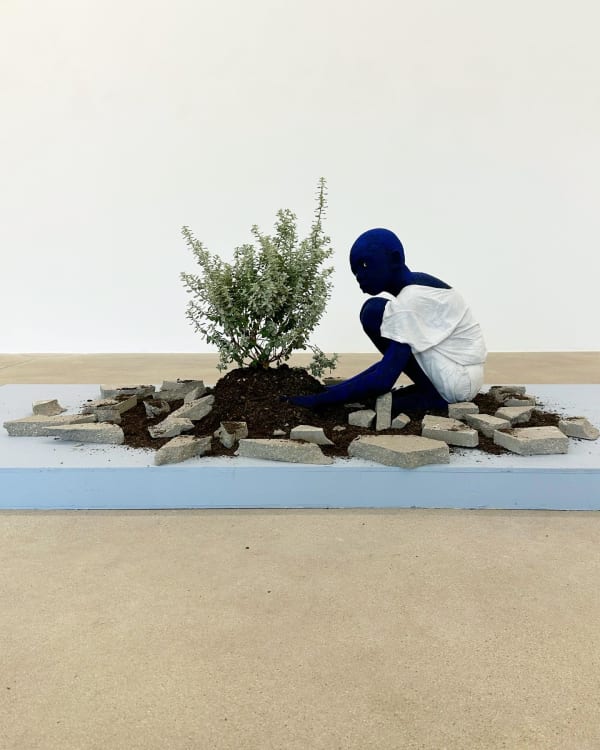 seated figure sitting