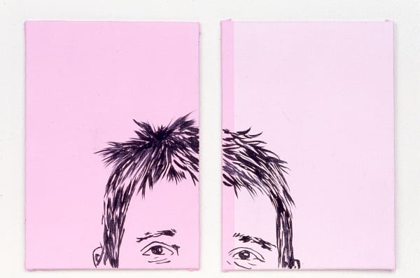 portrait on a pink background of a boy