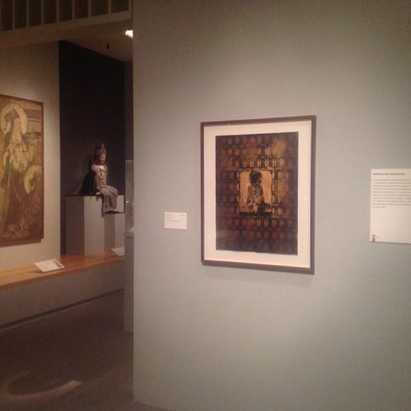 A picture containing wall, indoor, picture frame, gallery