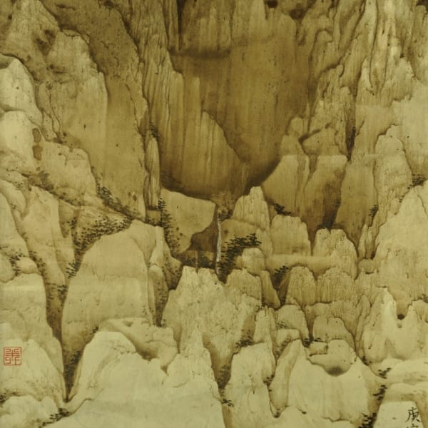 A stream of water in the middle of the yellow mountains