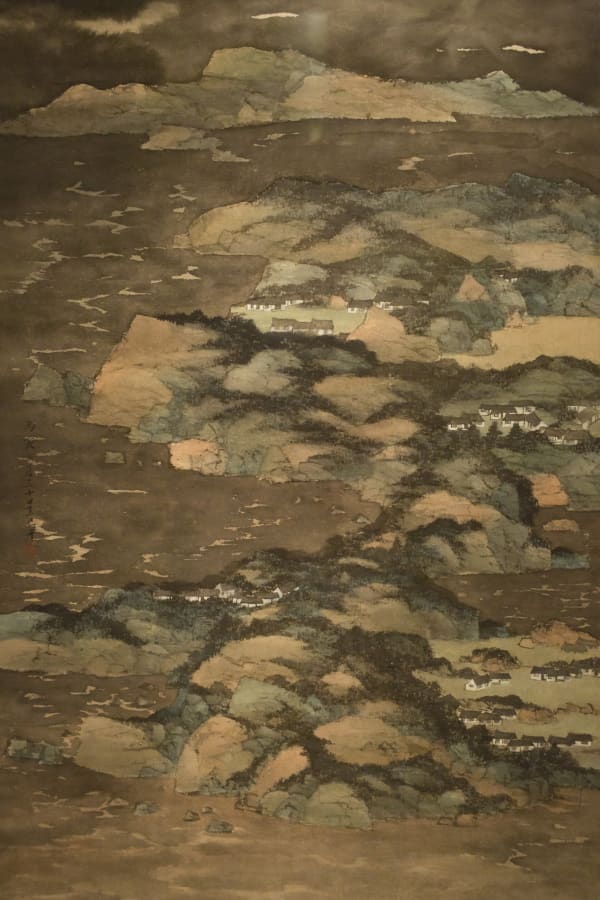 Brown-toned painting of a mountain 