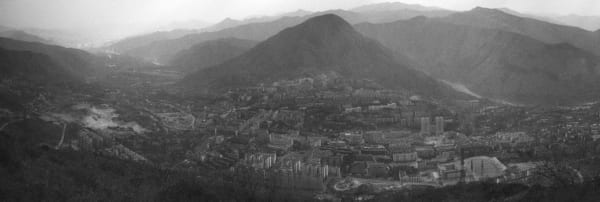 A picture containing panorama, black and white, nature, landscape