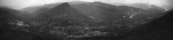 A picture containing panorama, black and white, nature, landscape
