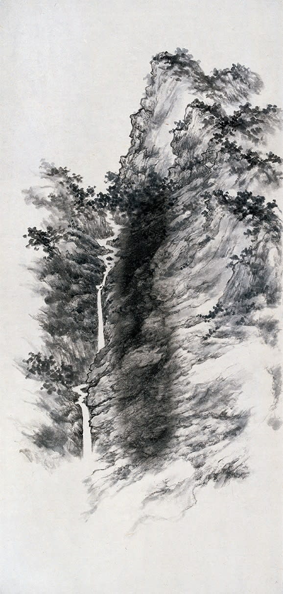 A landscape painting with a vertical composition, in which a sections of mountain is photo-printed in round shape with blur edge
