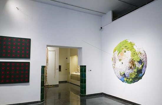 A picture containing indoor, gallery, scene, wall