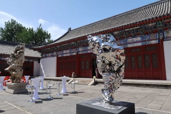 A sculpture outside of a building