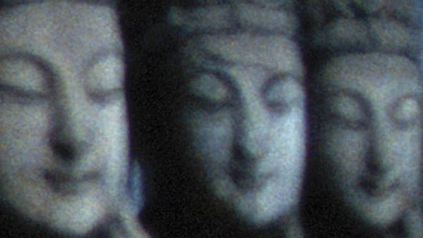 Three close-ups of the Buddha's face
