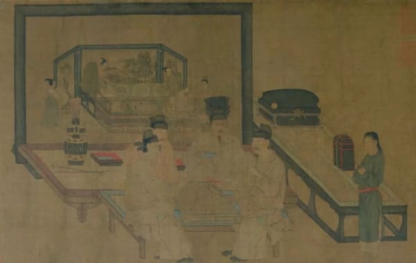 A painting of people sitting at a table, with a screen behind it and then the corresponding scene depicted on it