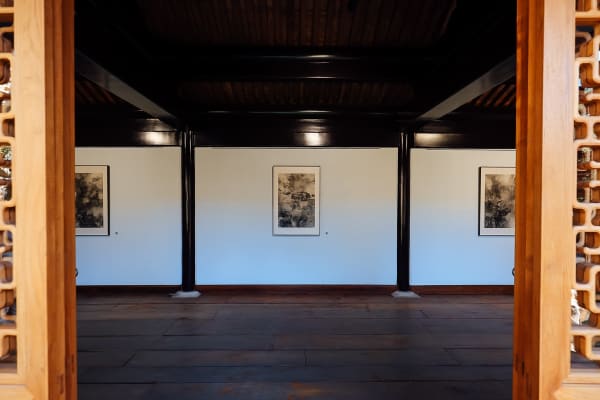 A picture containing indoor, art, wall, picture frame
