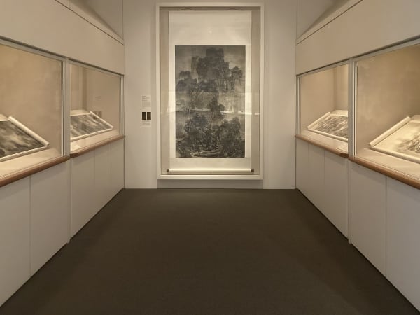 A picture containing indoor, wall, picture frame, gallery