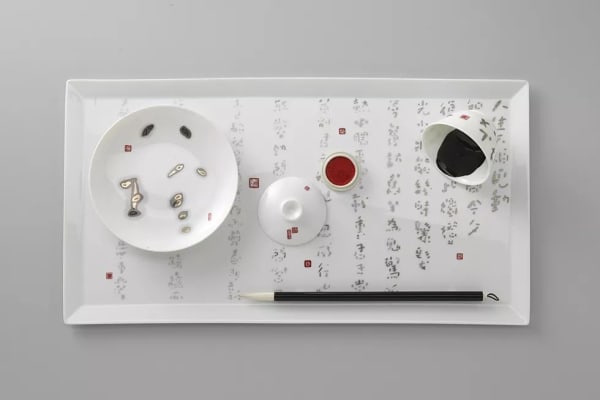 A picture containing power plugs and sockets, circle, electronics, indoor