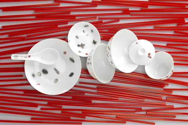 A set of porcelain placed on a red stick