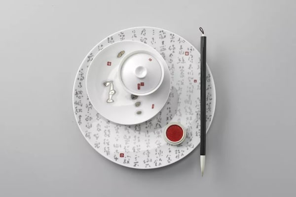 A picture containing circle, plate, design, indoor