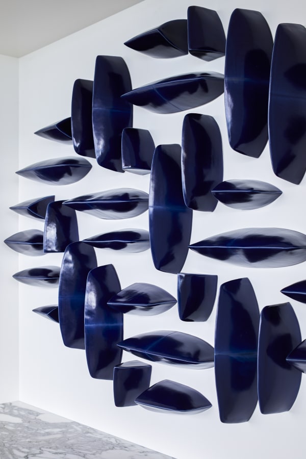 A commissioned wall sculpture by Maren Kloppman in the Miami beachfront home of an art collector. Courtesy Lovell Art Advisory. Photography by Eric Piasecki