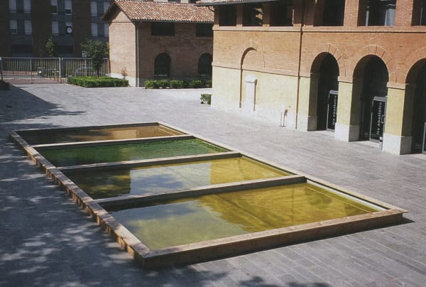 Survival Piece II: Notations on the Ecosystem of the Western Saltworks with the Inclusion of Brine Shrimp, 1972 Three ecosystems of Artemia brine shrimp, salt and algae. Each pond has varying salinity which influences the algae, organisms and color of water. The salt was then harvested from the ponds in a performative act. The piece was originally created for the seminal 1971 Los Angeles County Museum of Art exhibition, Art and Technology. Installation view from Les Abattoirs, Toulouse, France, 2002