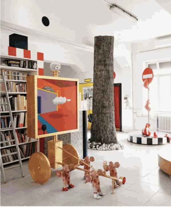 A Home With a Giant Falcon and a Ball of Wood With Human Legs