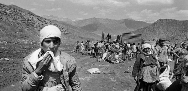 Gulf War Refugees. Kurdish families flee from Saddam Hussein's forces towards the end of the Gulf War. Farrell was the first Irish photographer to get back from the location. His dramatic images were used in all Irish newspapers. 18/4/1991. Photo: © Eamonn Farrell.