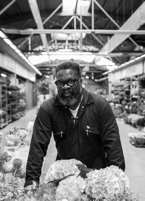 Artist Hugh Findletar at the flower market