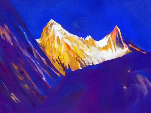 Sunlight on Annapurna mountain peaks near Annapurna Base Camp