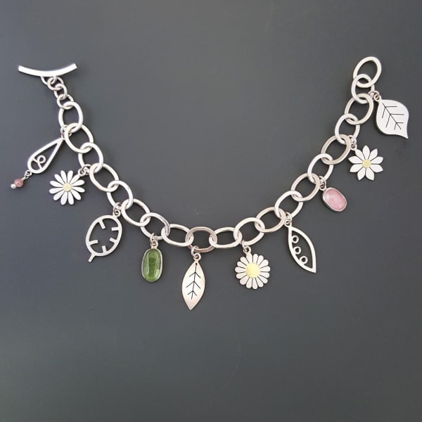 Diana Greenwood Summer Garden Bracelet, 2022 Sterling Silver, 18ct gold, pink and green tourmalines A stunning one of a kind bracelet which would make an extra-special gift.