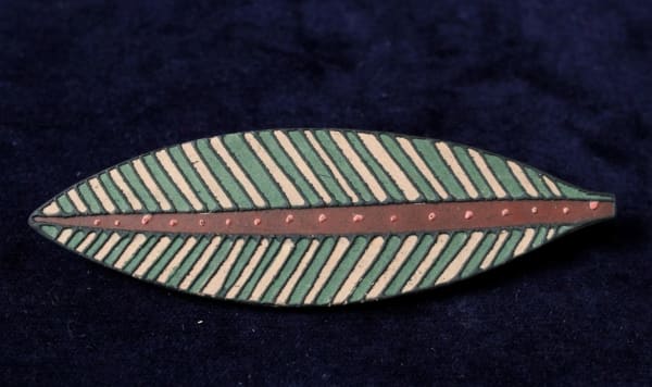 Joanna Veevers leaf brooch made from porcelain.