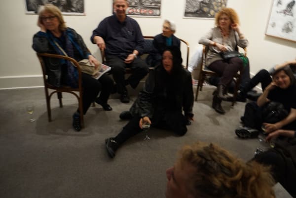 Photograph of visitors crowding the gallery at the opening of the exhibition "Mad as Hell," 2012