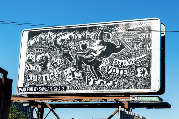 Photograph of Sue Coe's billboard-sized artwork "We Are Many, They Are Few"