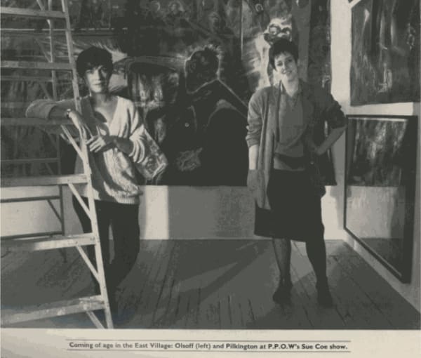 Wendy Olsoff and Penny Pilkington of P.P.O.W. stand in front of an installation view of Sue Coe's Vigilante, 1985