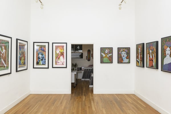 Installation shot of Chuck Sperry prints in gallery space