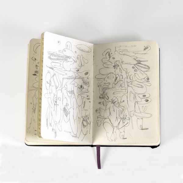 scratchy abstract illustrations inside of a notebook