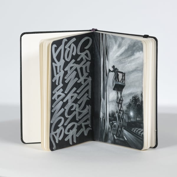 Black and White illustration inside of a Moleskine notebook