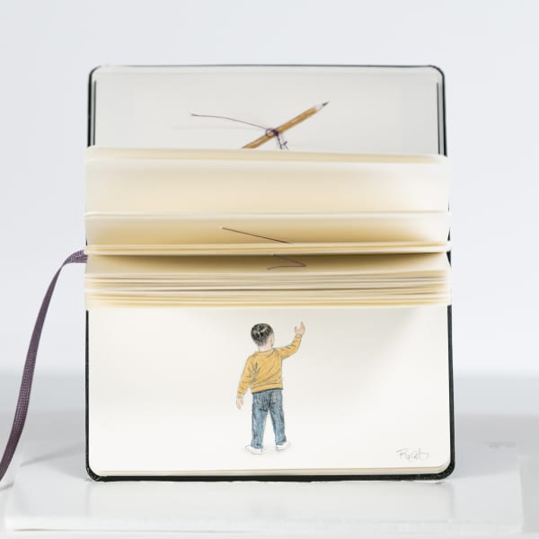 drawing in a moleskin notebook of a young boy with his back turned to the viewer and one arm lifted towards the sky