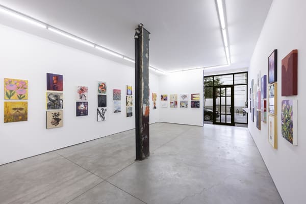 Installation image of 16 x 20 paintings in the Summer Group exhibition