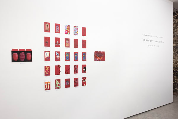 installation photograph of lunar new year red envelopes hung on a white wall 