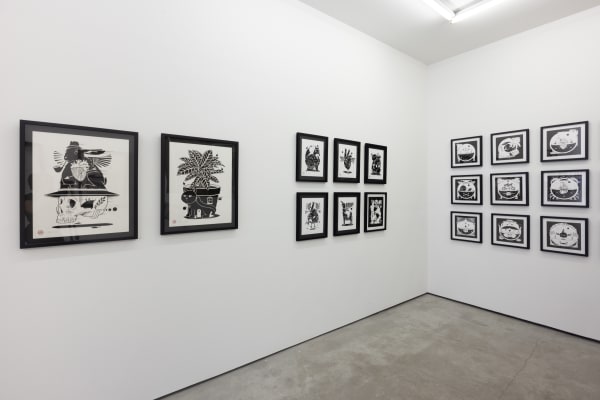 black and white illustration by artist Jeremy Fish on a white wall