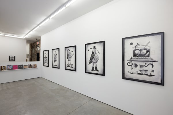 black and white illustrations by artist Jeremy Fish on a white wall