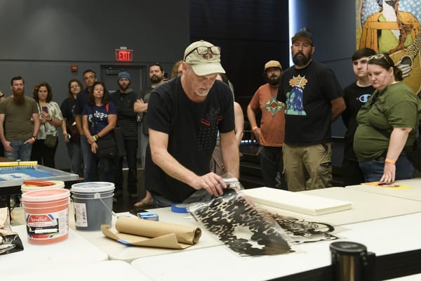 Chuck Sperry performing a work demonstration