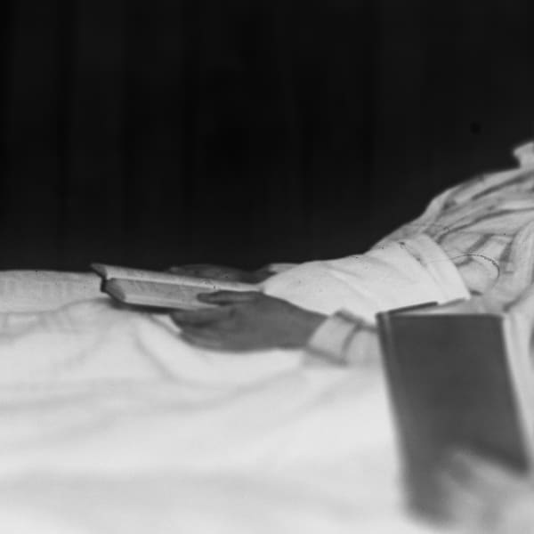 Detail from Joseph Divis’ photo of Two boys in Waiuta hospital, recovering from being lost in the bush. (Books). Alexander Turnbull Library, New Zealand: 1/2-233347-G. 2020.