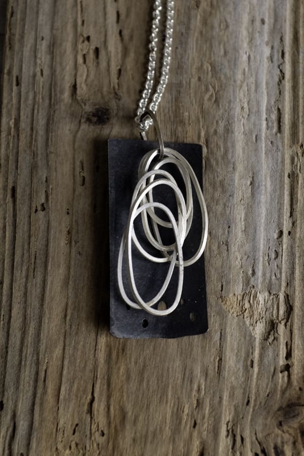 White Looping Scribble pendant on 22" chain oxidised silver 25mm wide x50mm high Stuart Cairns