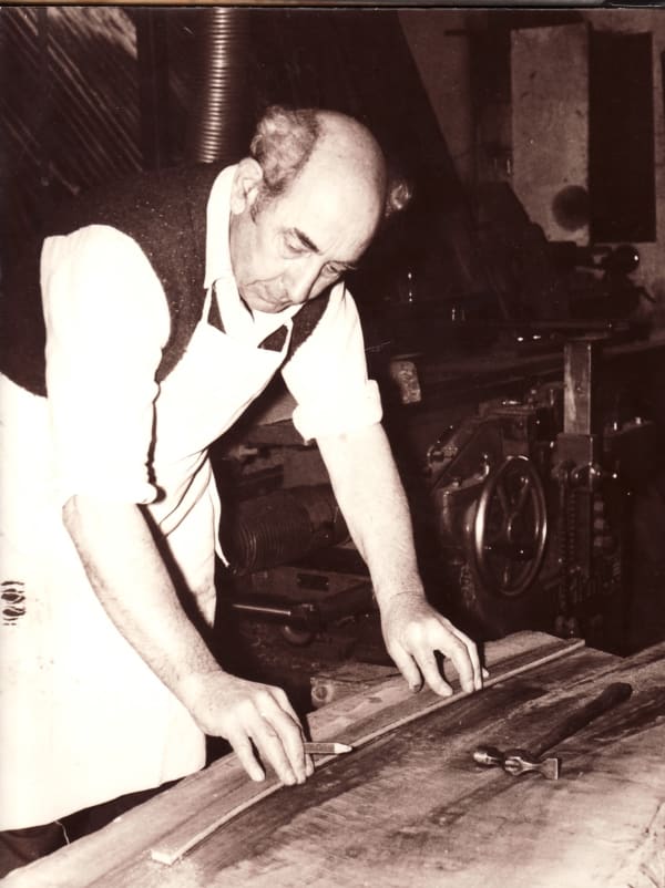 Bert Upton marking out chair components on a board of Cuban mahogany