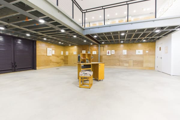 Installation view of NH DePass' exhibition at Sibyl Gallery titled Squiggle. The exhibition consists of roughly 40 framed drawings and one sculpture.