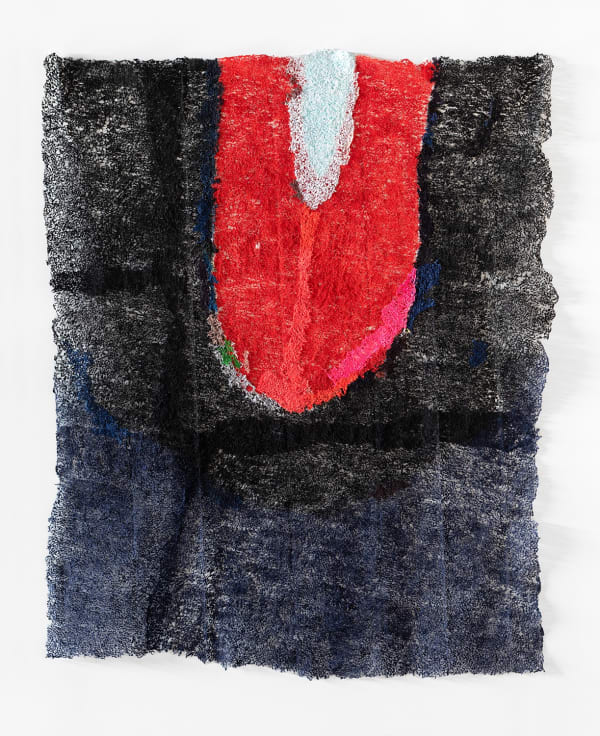 Large vertical abstract fiber artwork with deep red center with black surrounding.