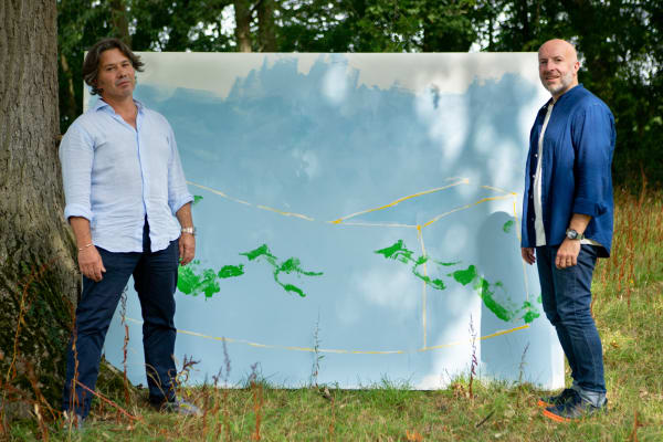 Magnus Hammick and Paul Newman with painting in the grounds of Close House, Somerset