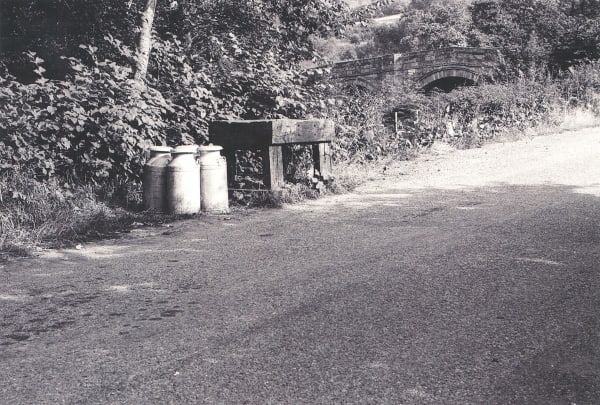 William Tillyer The Furnished Landscape - Milk Stands, 1977 Photograph 40.5 x 61.5 cms (15 15/16 x 24 1/4 ins) PRINTER The Artist