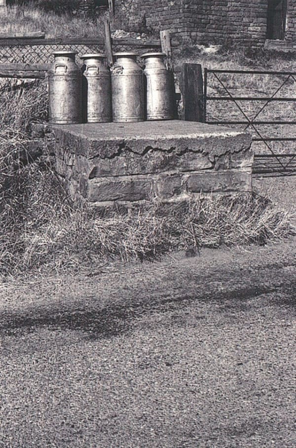 William Tillyer The Furnished Landscape - Milk Stands, 1977 Photograph 61.5 x 40.5 cms (24 1/4 x 15 15/16 ins) PRINTER The Artist
