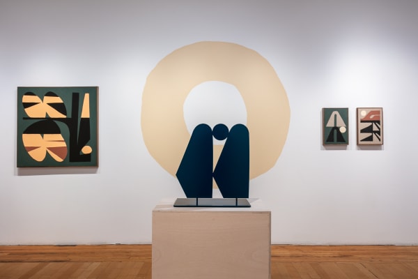 View of back right wall. Mid Level Manipulated Time Stretch framed by a beige ring painted on the opposite wall. On the left of the wall is Mostly Inanimate Subject Matter (Garden of Feelings Still Life) and on the right is Aftertouch and Vibrato Depth.