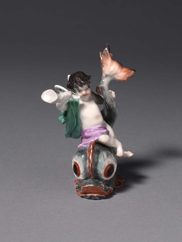 A Meissen figure of a Putto riding a Dolphin, Circa 1750.